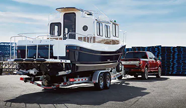 2022 Nissan TITAN Truck towing boat | Ken Ganley Nissan Mayfield in Mayfield Heights OH