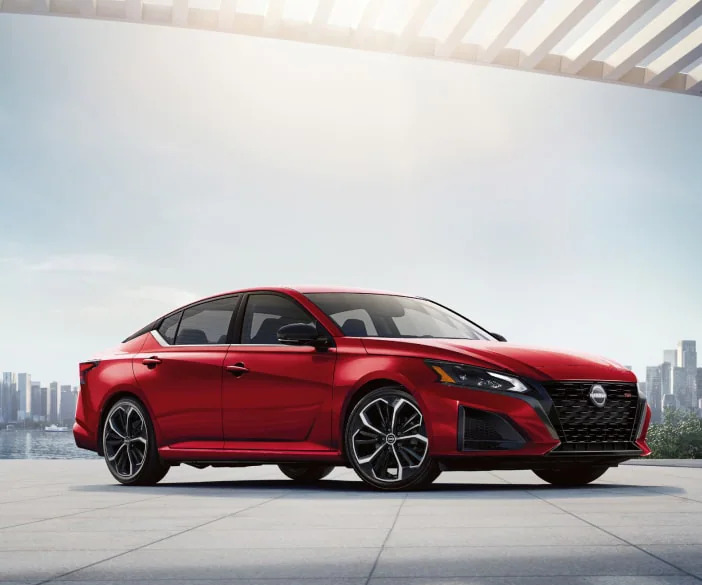 A 2025 Nissan Altima parked outside a cityscape in Mayfield Heights, OH