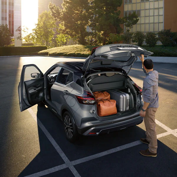 2024 Nissan Kicks view of hatch open and cargo area with luggage