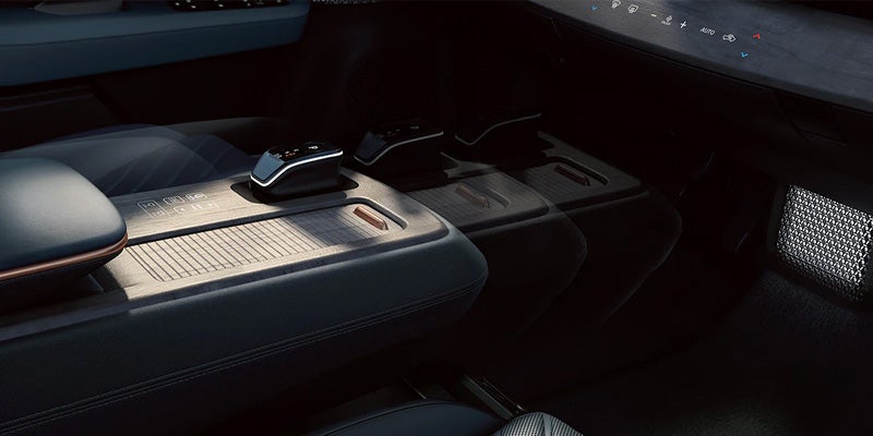 The center console of the 2024 Nissan ARIYA in Mayfield Heights, OH