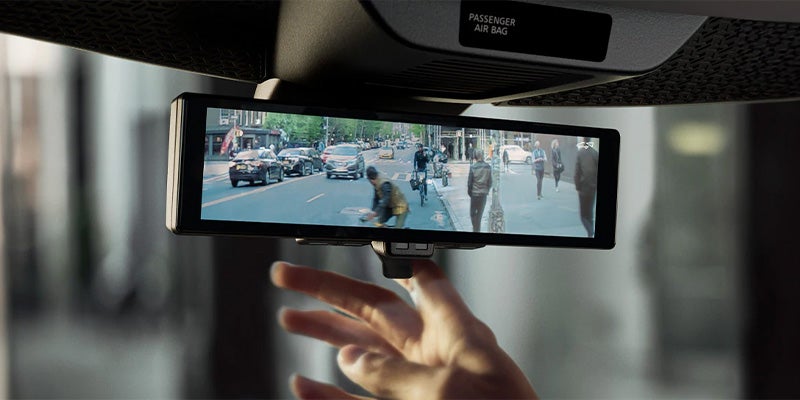 The rearview mirror in the 2024 Nissan ARIYA in Mayfield Heights, OH