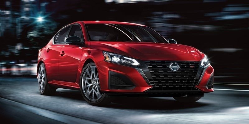 A 2024 Nissan Altima that is cruising down the road in Mayfield Heights, OH