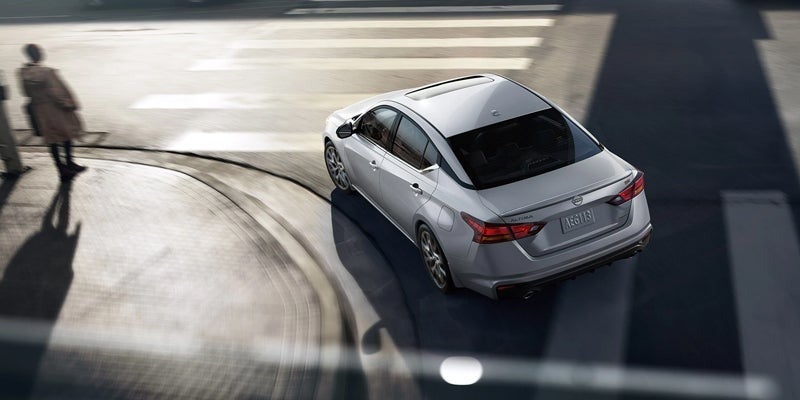 A 2024 Nissan Altima taking a tight turn in Mayfield Heights, OH