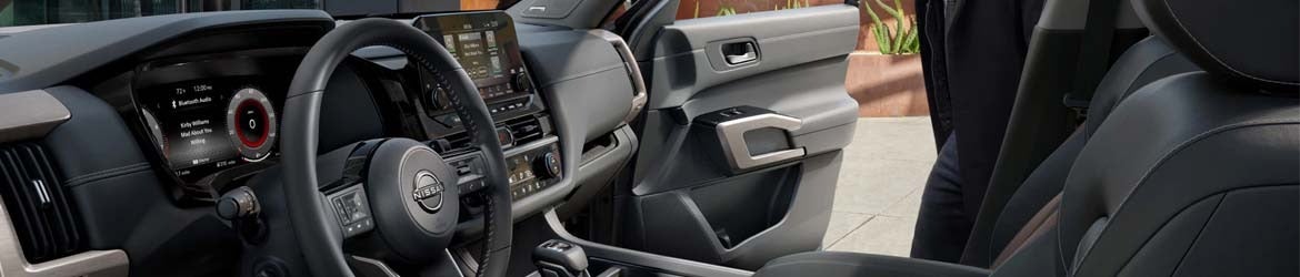 An open door of a 2024 Nissan Pathfinder in Mayfield Heights, OH